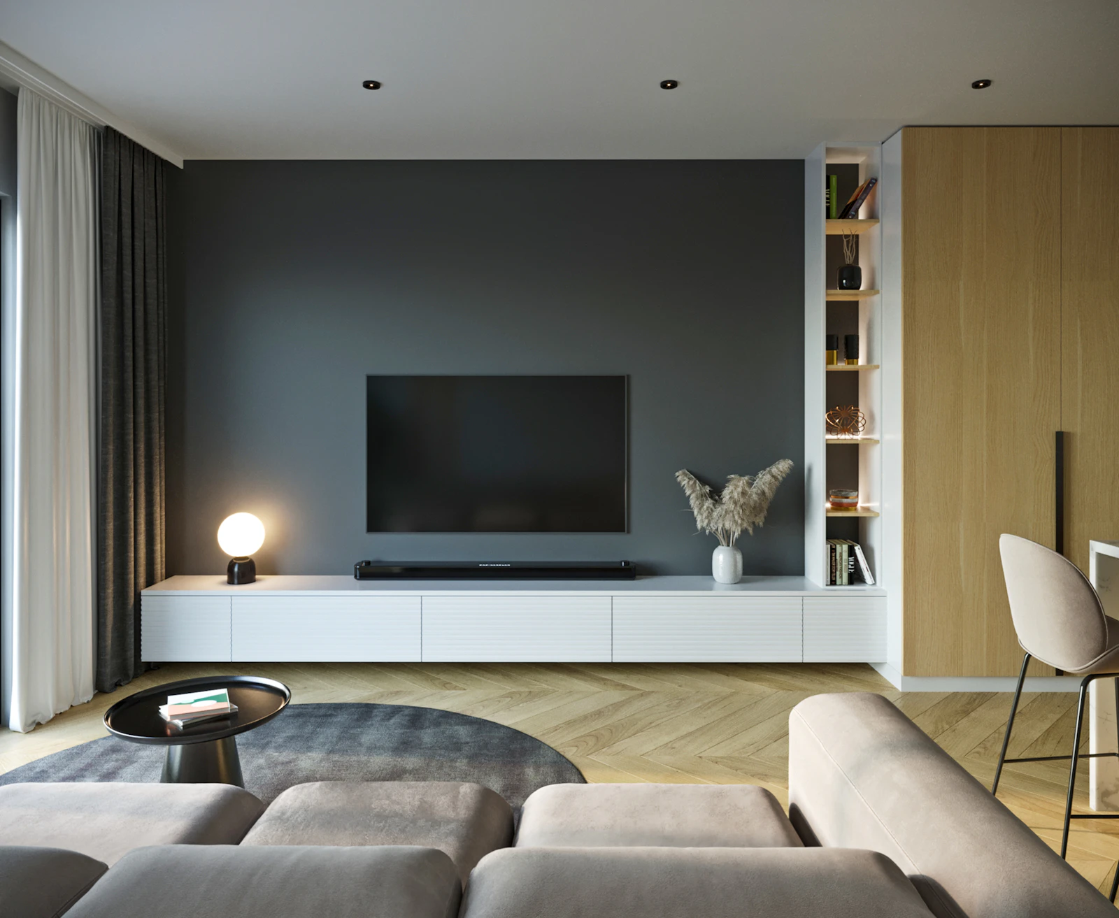 A calm living room with a wall-mounted TV showing the Duo Smart TV App home screen